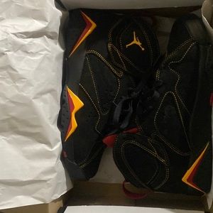 Air Jordan’s 7retro BG ,black and red with a touch of golden yellow color
